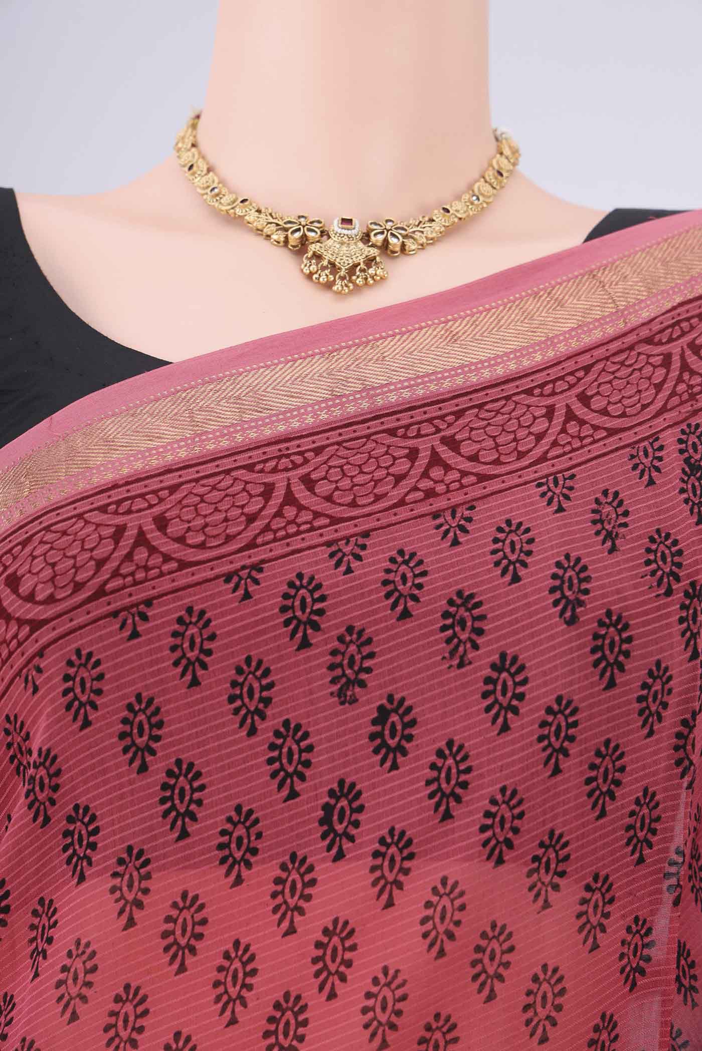 Border image of Coral Maheshwari Silk Cotton Saree with Printed design on the body and Zari Border. 