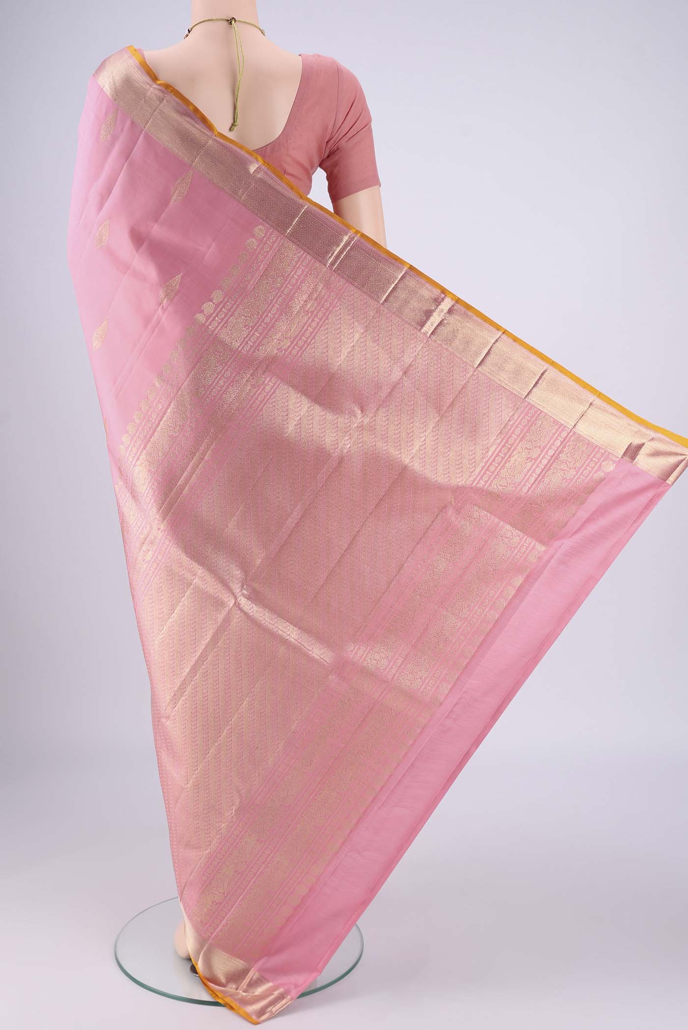 Flat view of Rose pink Nangavalli Silk [ Salem ] Saree with Zari Butta on the body and Zari Border. 