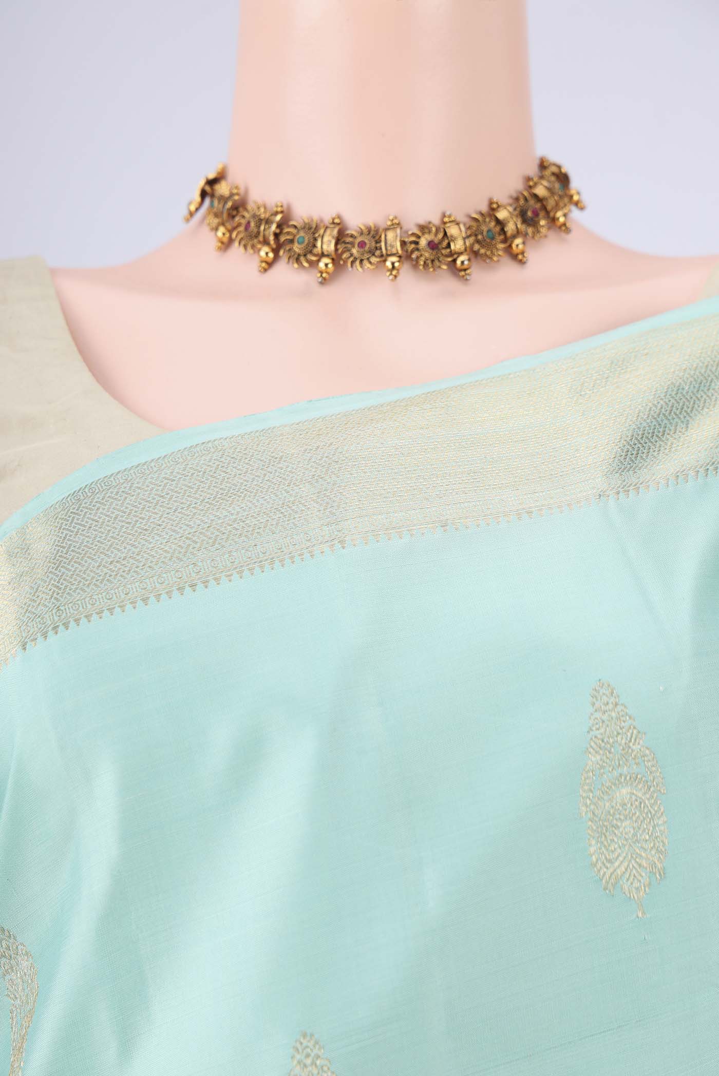 Border image of Mint Green Dual Tone Kanjivaram Saree with Zari Butta on the body and Zari Border. 