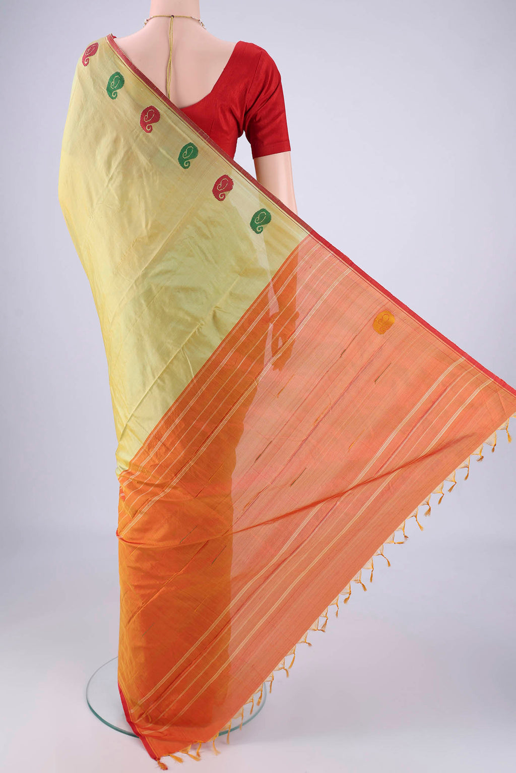 Flat view of Light Green Dual Tone Kanchipuram Silk Saree with Plain Body and Thread Border. 