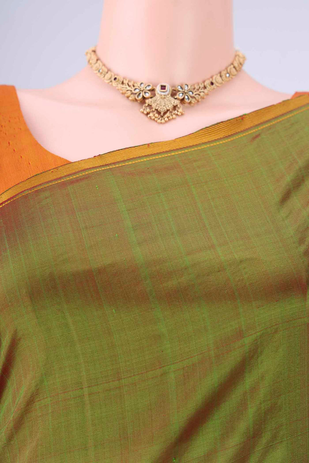 Border image of Light Green Kanchipuram Silk Saree with Plain Body and Thread Border. 