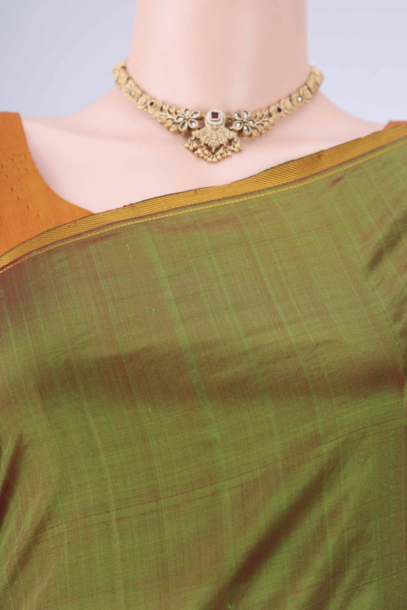 Border image of Light Green Kanchipuram Silk Saree with Plain Body and Thread Border. 