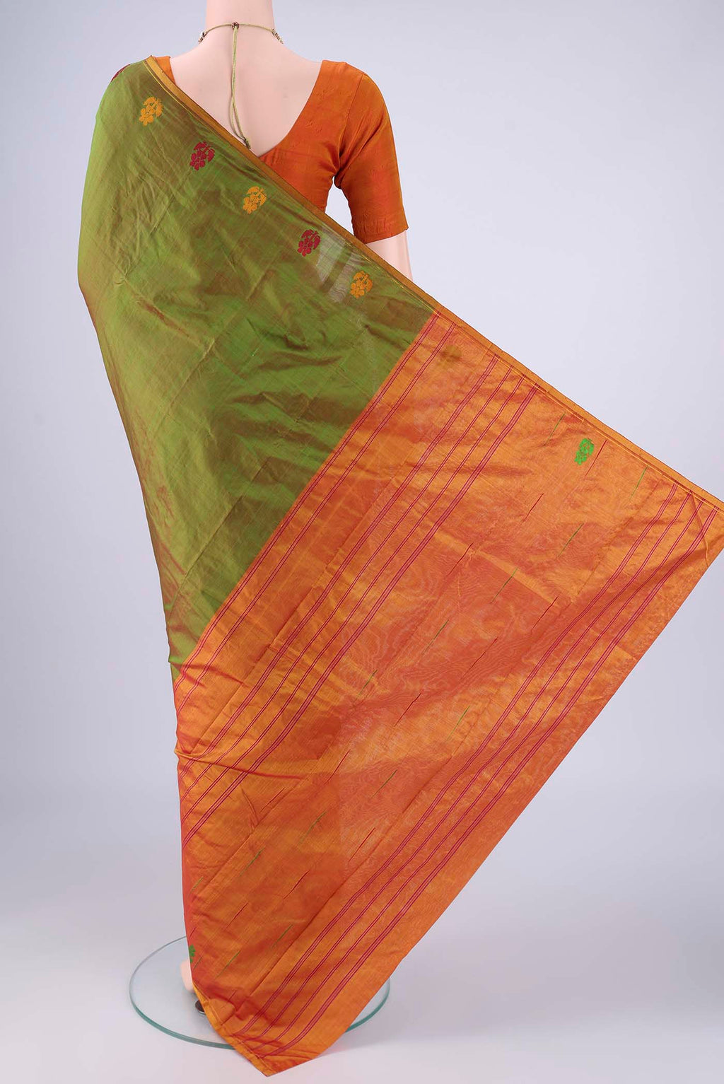 Flat view of Light Green Kanchipuram Silk Saree with Plain Body and Thread Border. 