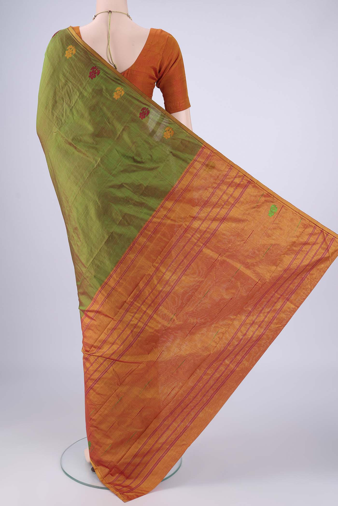 Flat view of Light Green Kanchipuram Silk Saree with Plain Body and Thread Border. 