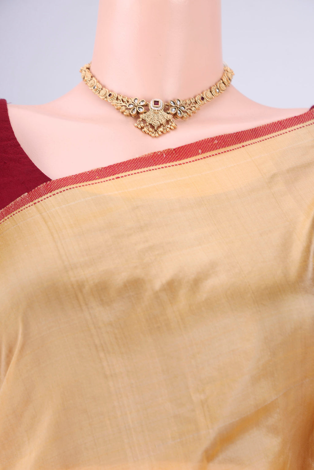Border image of Sandal Kanchipuram Silk Saree with Plain Body and Thread Border. 