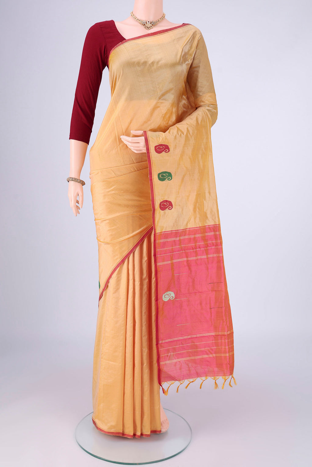 Sandal Kanchipuram Silk Saree with Plain Body and Thread Border.  displayed on a mannequin