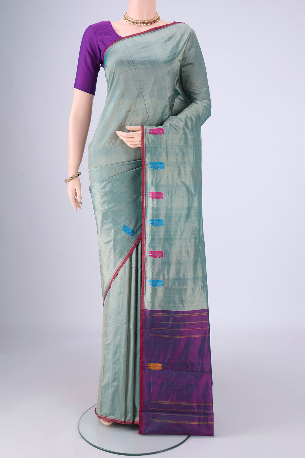 Davys Grey Kanchipuram Silk Saree with Plain Body and Thread Border.  displayed on a mannequin