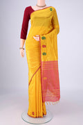 Yellow Kanchipuram Silk Saree with Plain Body and Thread Border.  displayed on a mannequin