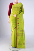 Parrot Green Kanchipuram Silk Saree with Thread Butta on the body and Thread Border.  displayed on a mannequin
