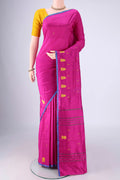 Magenta Kanchipuram Silk Saree with Thread Butta on the body and Thread Border.  displayed on a mannequin