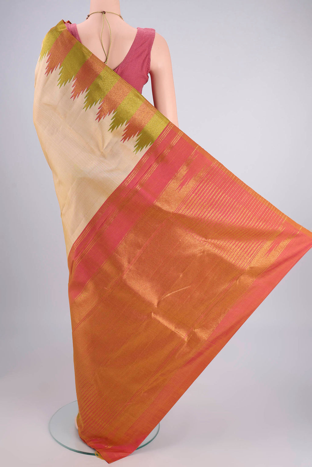 Flat view of Beige Kanjivaram Silk Saree with Plain Body and Temple Border. 