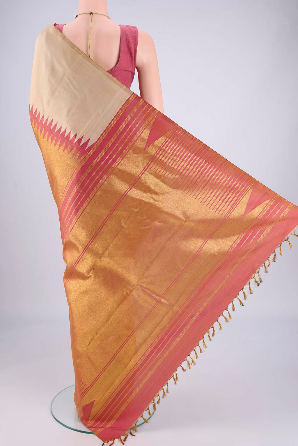Flat view of Beige Dual Tone Kanjivaram Silk Saree with Plain Body and Rising Temple Border. 