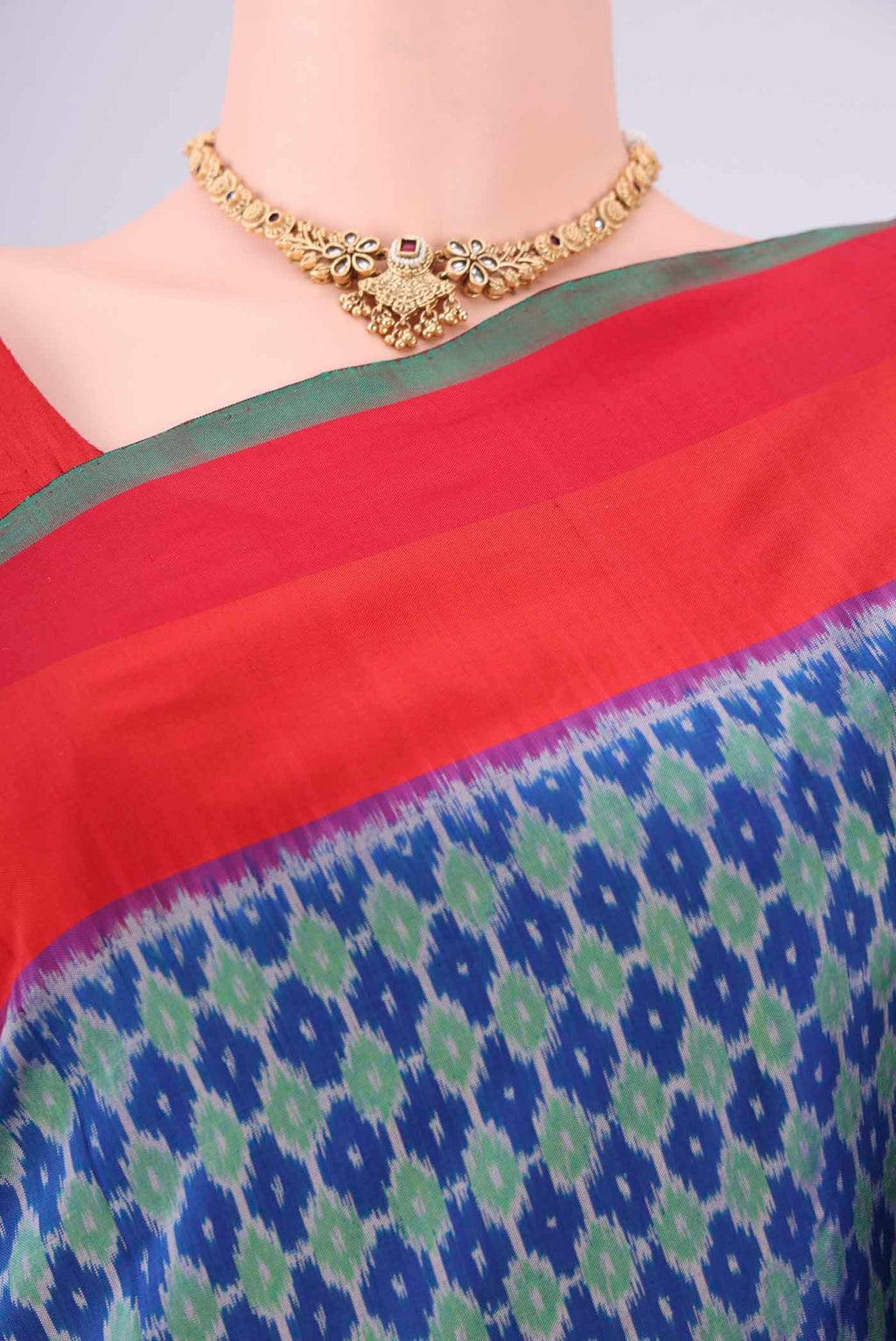 Border image of Blue Pochampally Silk Saree with Ikat design on the body and Zari Border. 