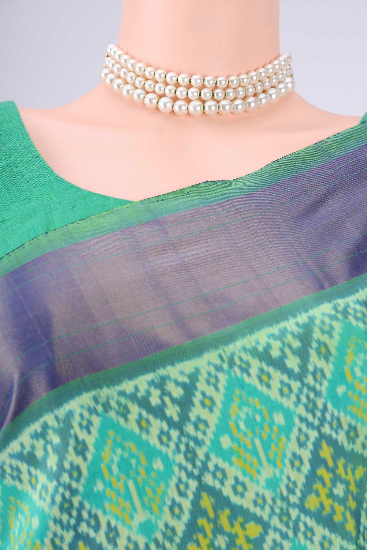 Border image of Sea Green Pochampally Silk Saree with Ikat design on the body and Zari Border. 