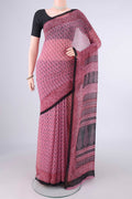 Pink Mysore Chiffon Saree with Floral Print on the body and Printed Border.  displayed on a mannequin