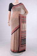 Beige Mysore Chiffon Saree with Printed design on the body and Printed Border.  displayed on a mannequin