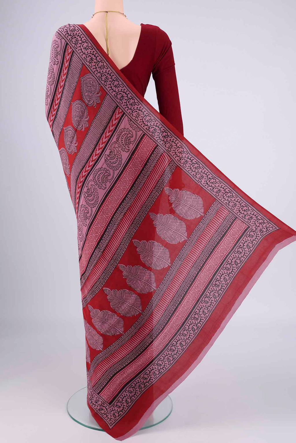 Flat view of Dark Mauve Mysore Crepe Saree with Printed design on the body and Printed Border. 