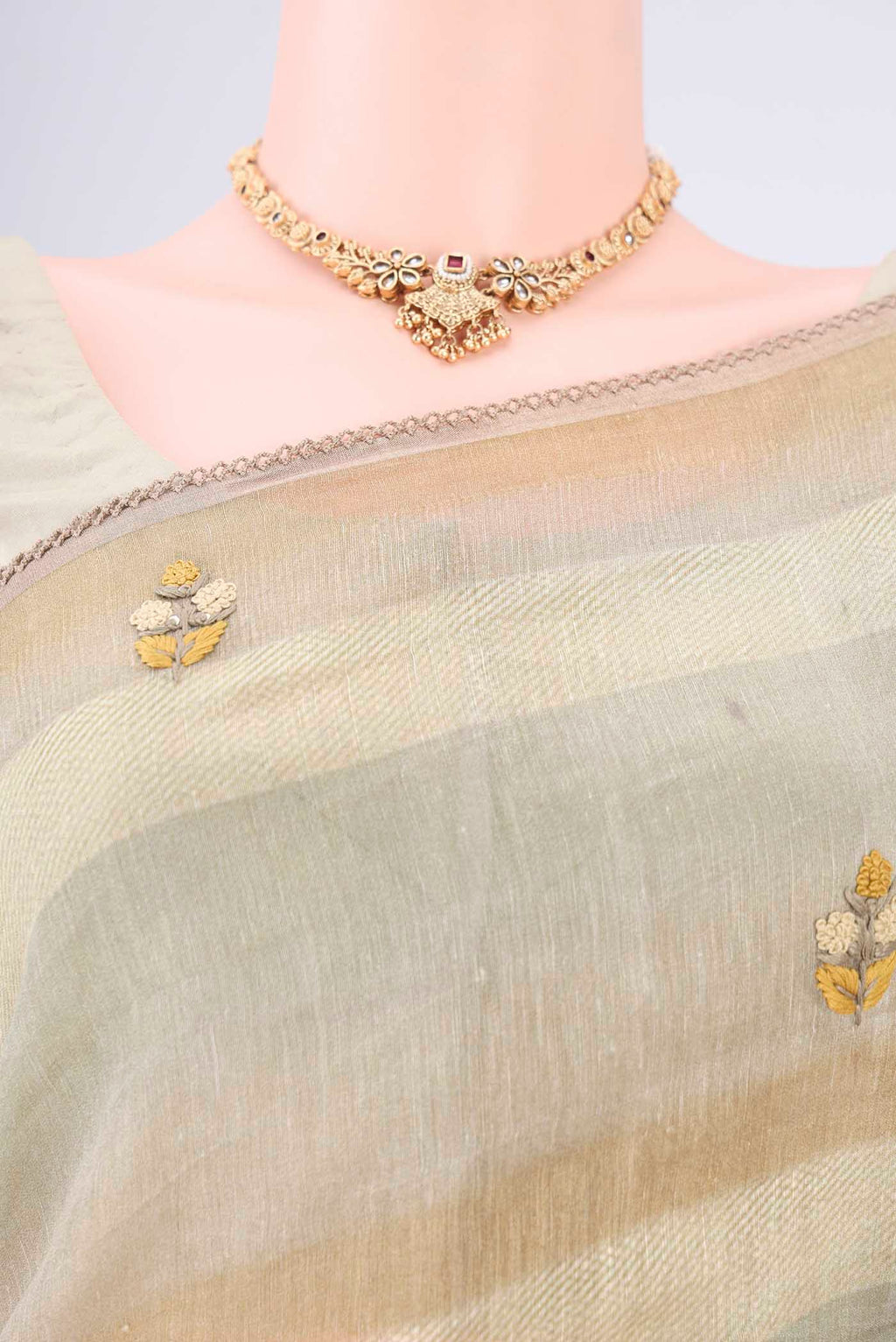 Border image of Sage Green Linen Saree with Embroidery on the body and Lace Border. 