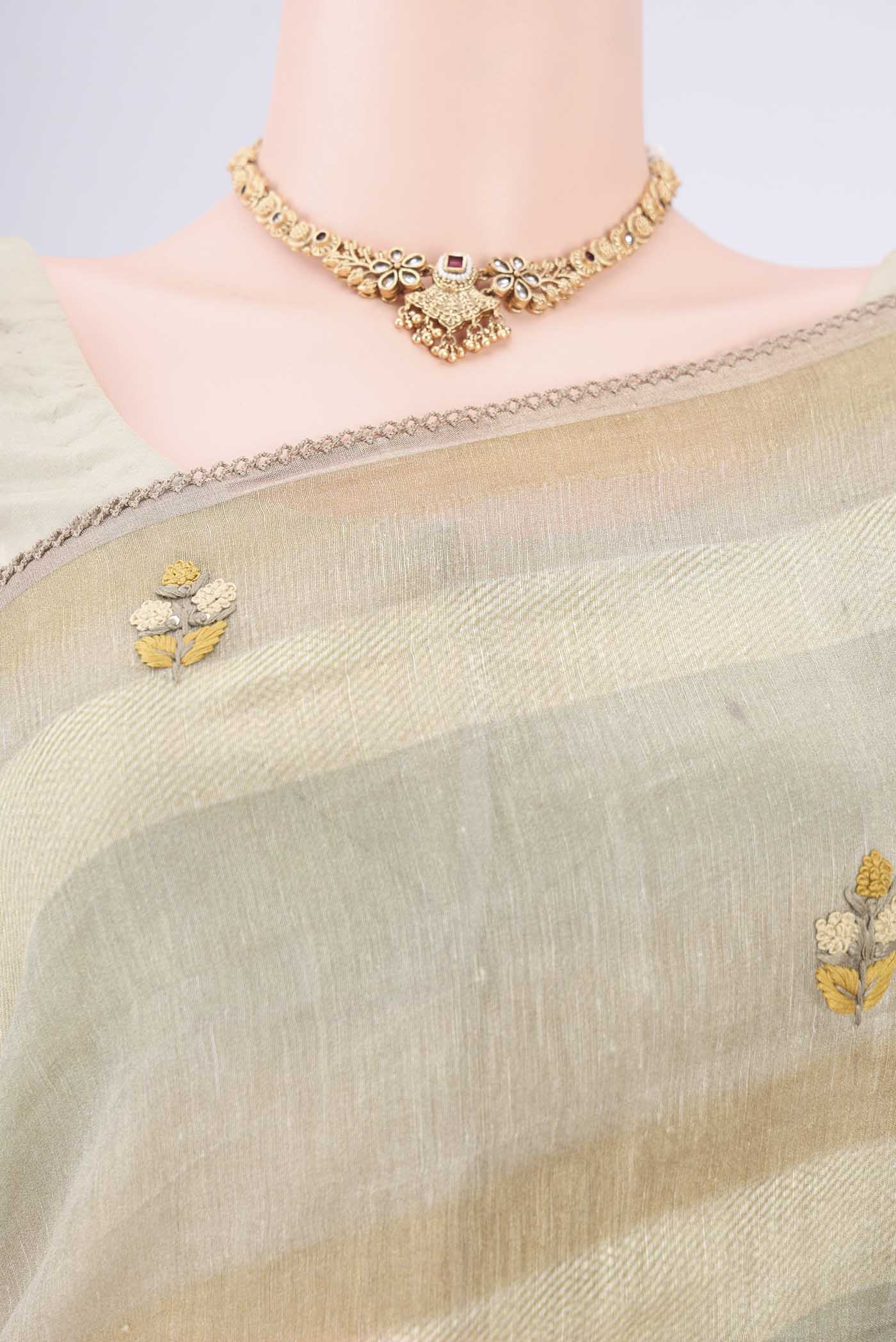 Border image of Sage Green Linen Saree with Embroidery on the body and Lace Border. 
