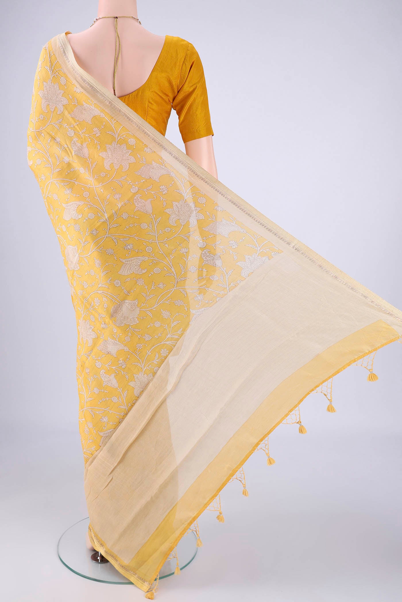 Flat view of Lemon Yellow Chanderi Silk Cotton Saree with Printed design on the body and Zari And Thread Border. 