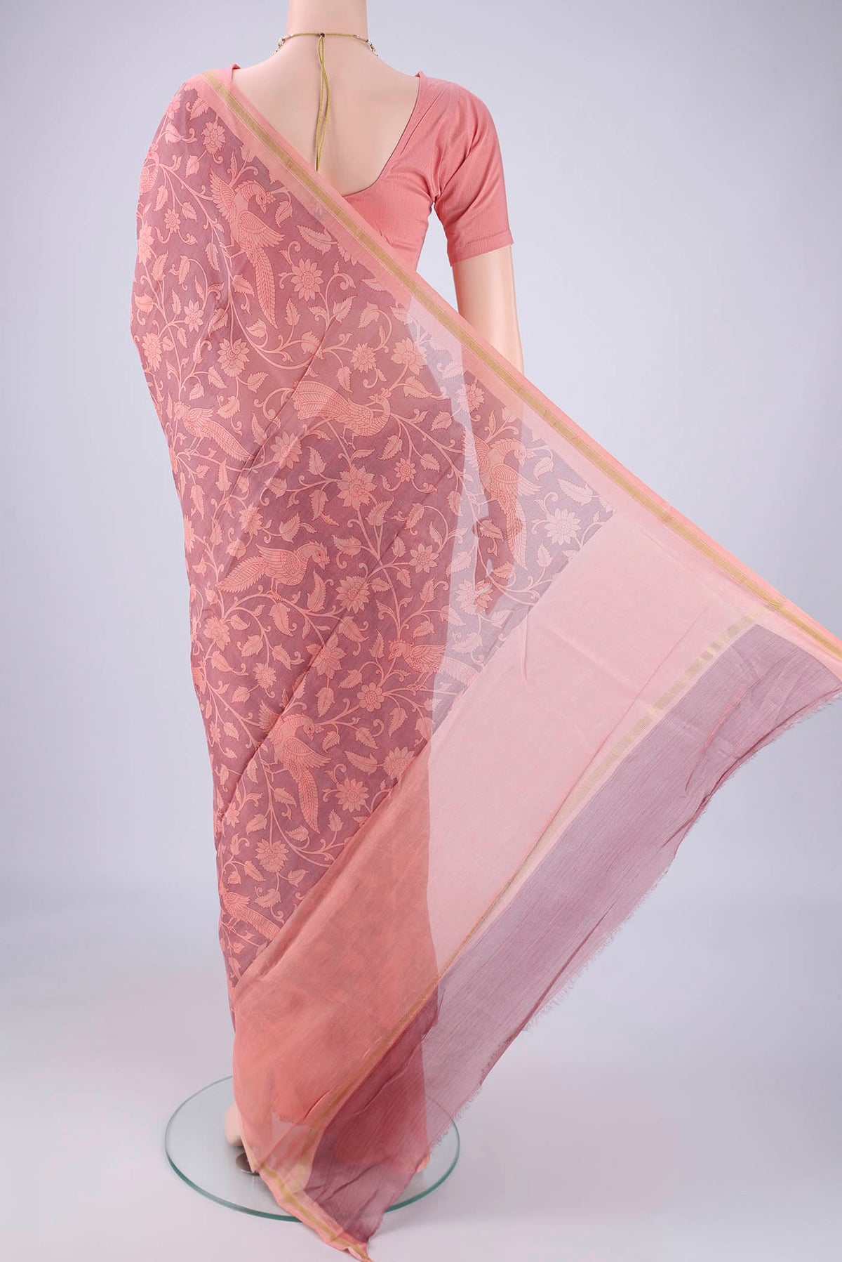 Flat view of Rose pink Chanderi Silk Cotton Saree with Printed design on the body and Zari Border. 