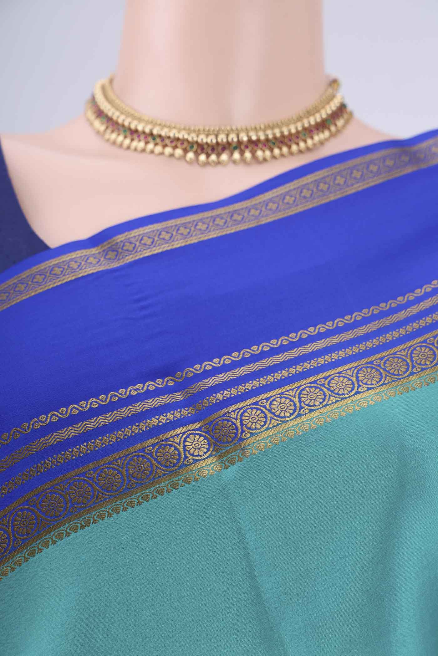 Border image of Turquoise Mysore Crepe Saree with Plain Body and Zari Border. 