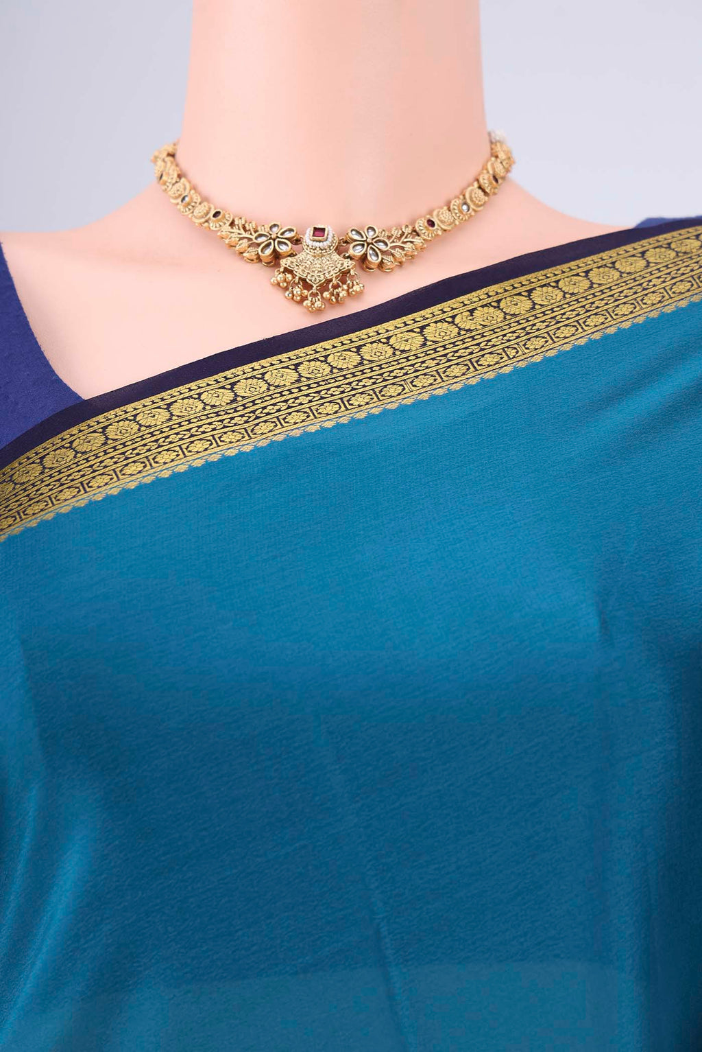 Border image of Teal Mysore Crepe Saree with Plain Body and Zari Border. 
