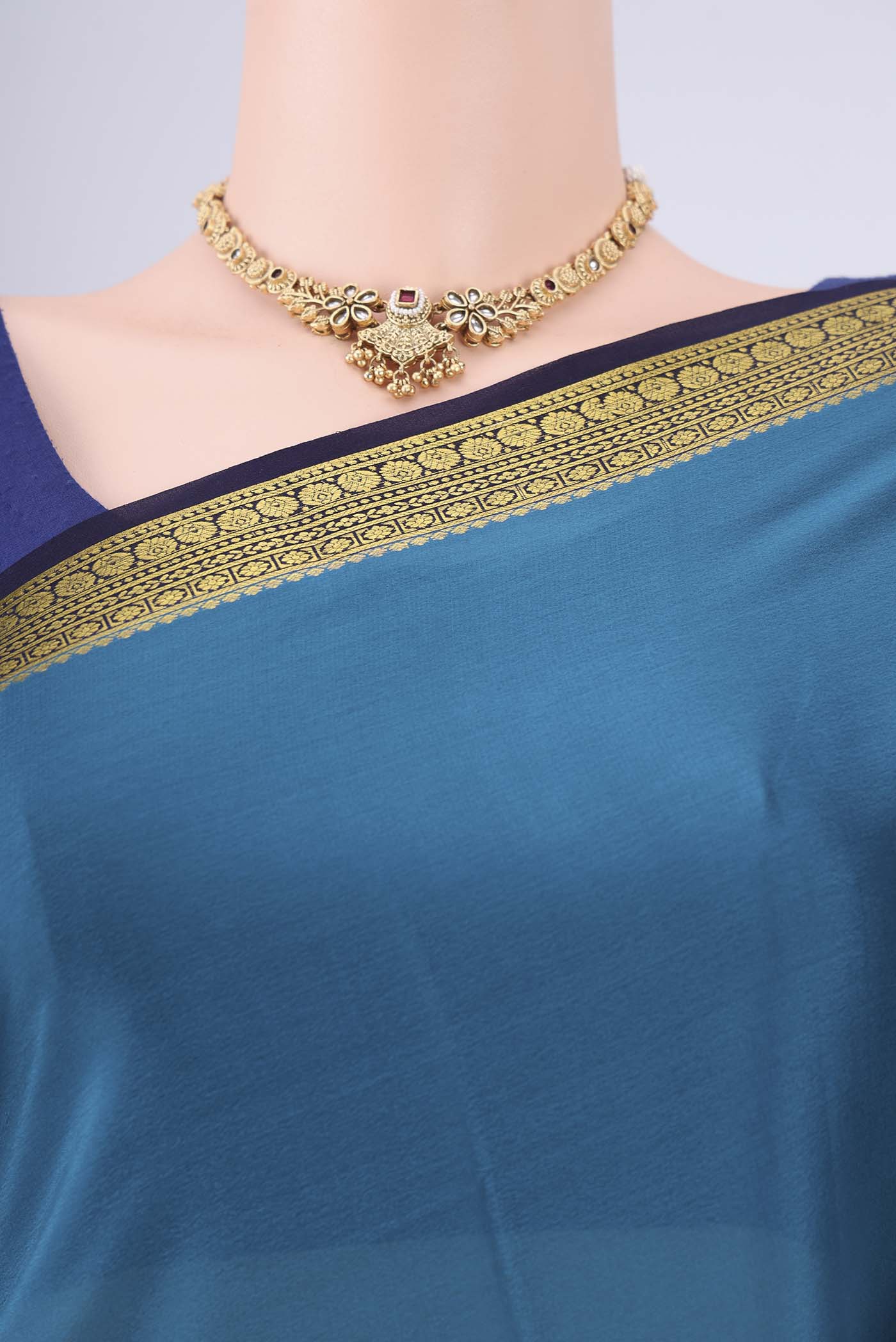 Border image of Teal Mysore Crepe Saree with Plain Body and Zari Border. 