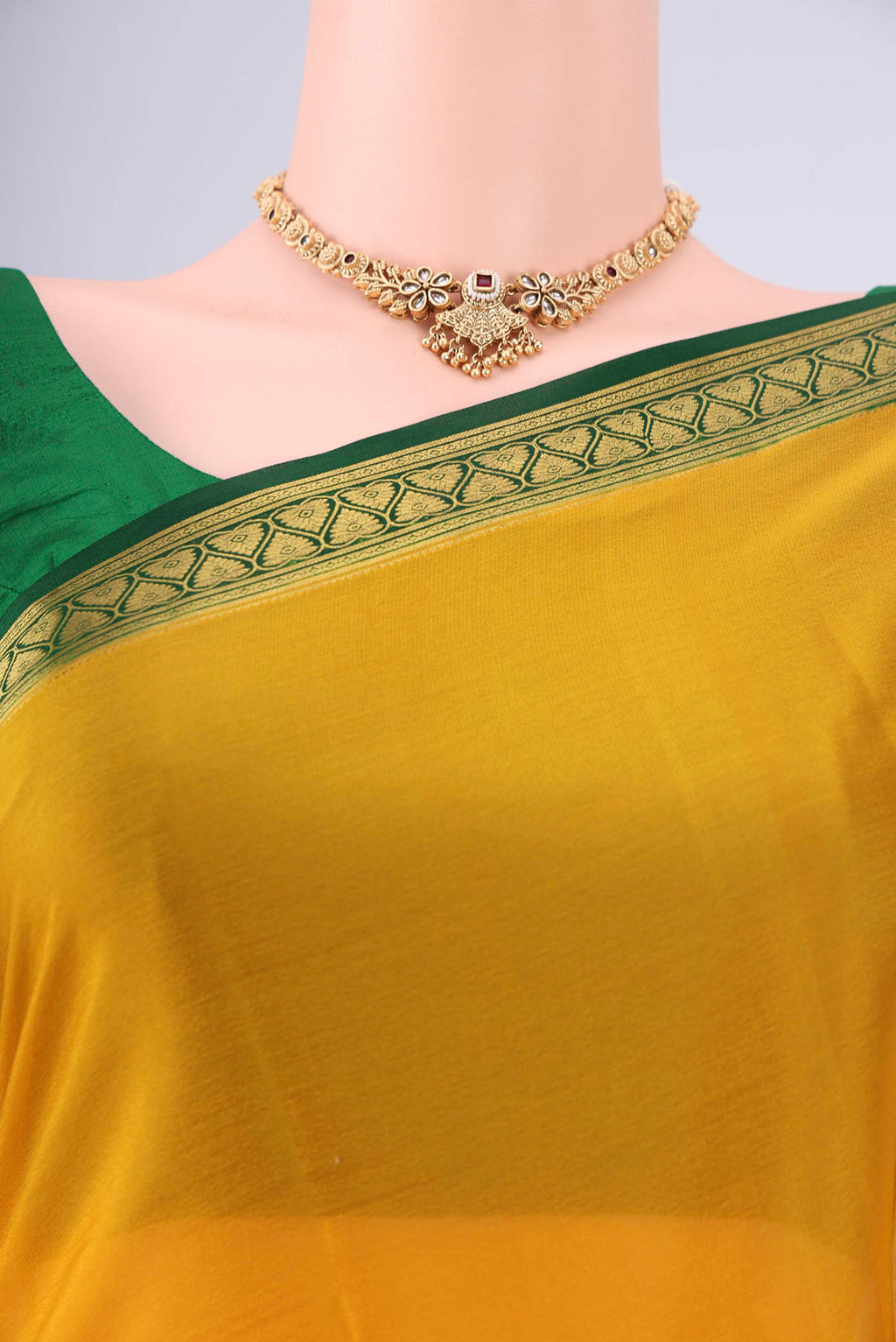 Border image of Mustard Mysore Crepe Saree with Plain Body and Zari Border. 