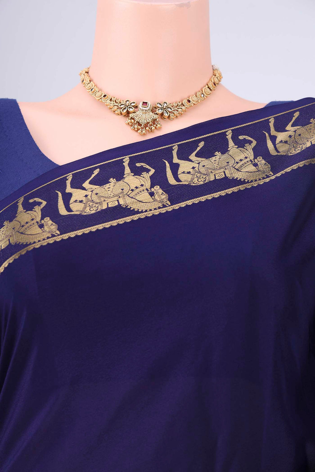 Border image of Navy Blue Mysore Crepe Saree with Plain Body and Zari Border. 