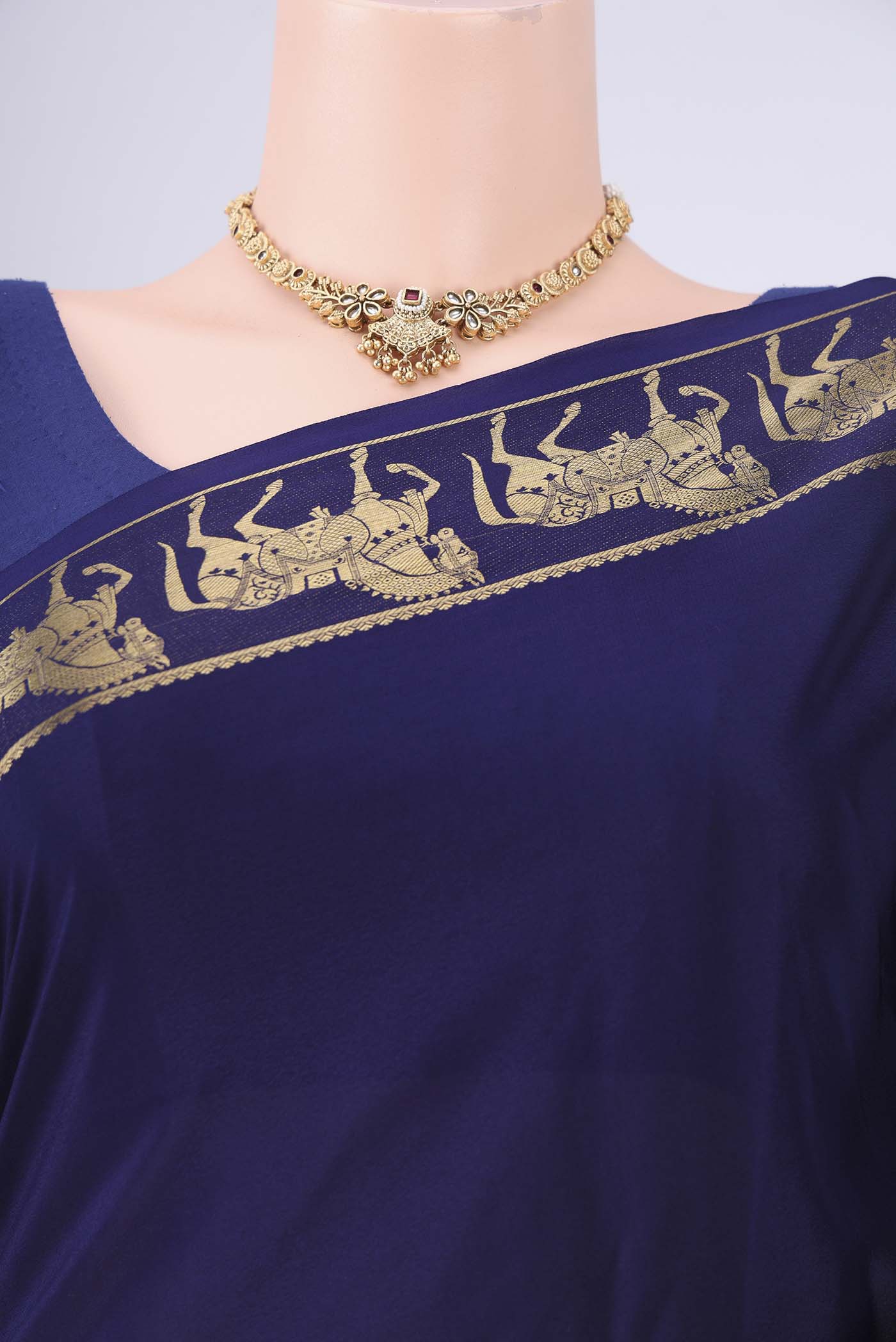 Border image of Navy Blue Mysore Crepe Saree with Plain Body and Zari Border. 