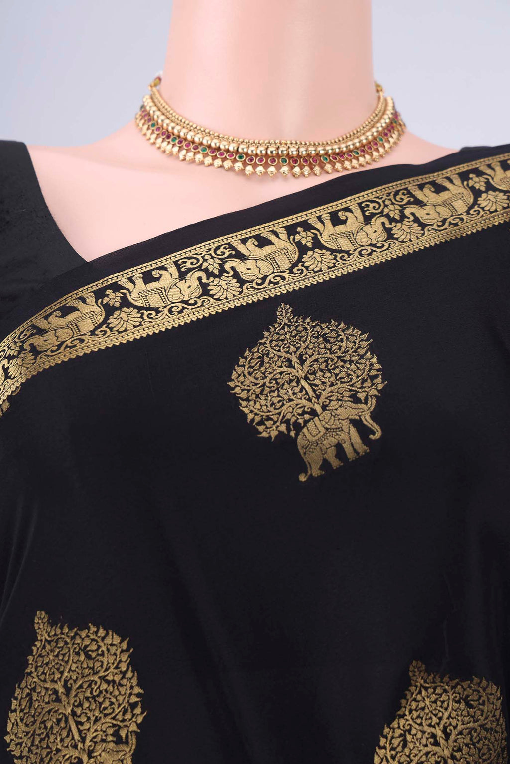 Border image of Black Mysore Crepe Saree with Zari Butta on the body and Zari Border. 