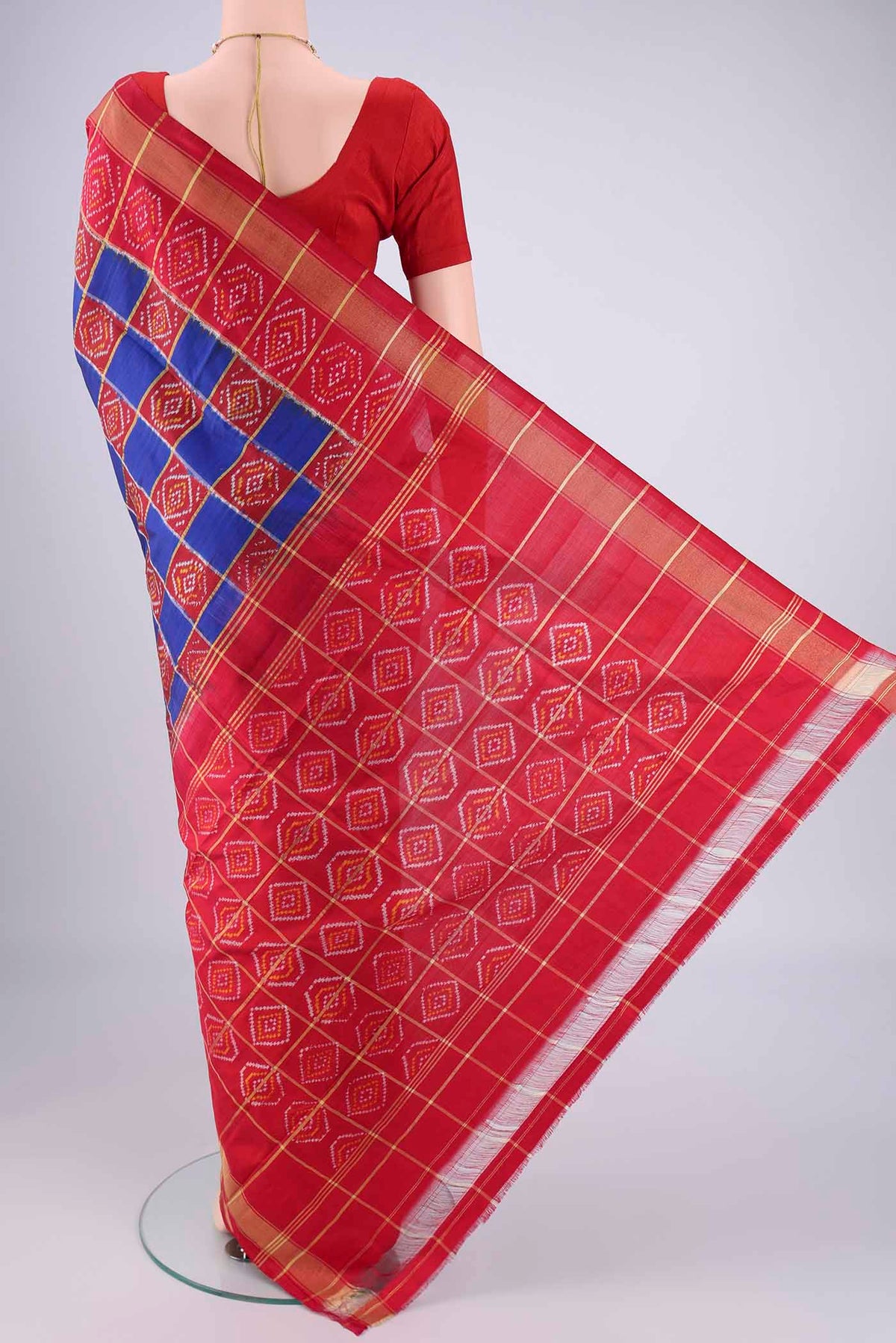Flat view of Multi Color Pochampally Silk Saree with Pure Ikat on the body and Zari Border. 