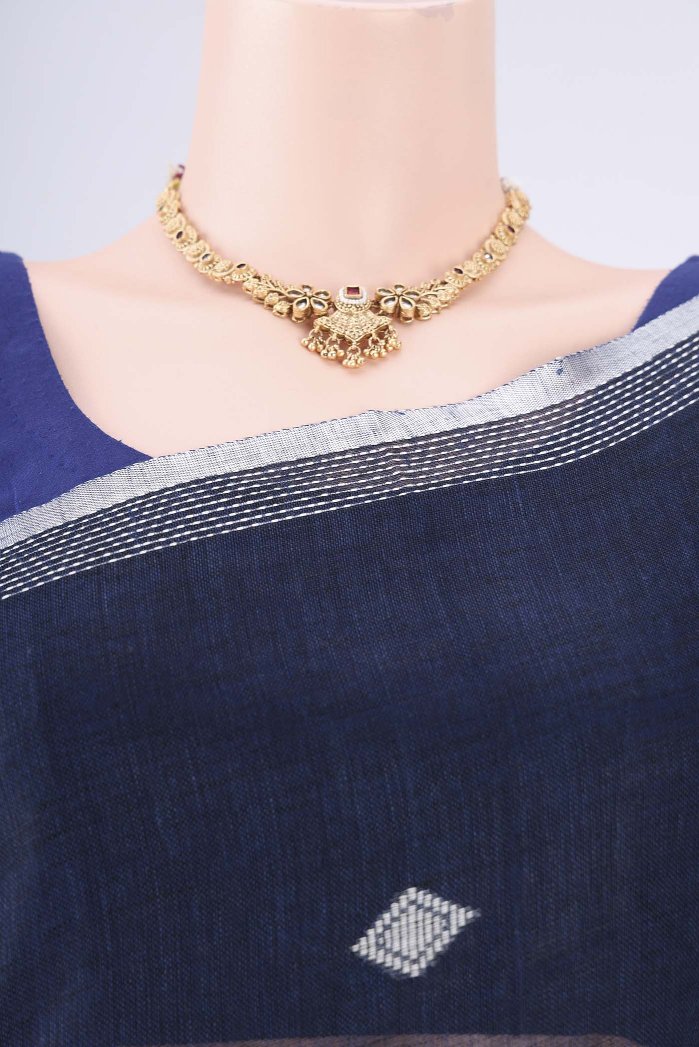 Border image of Navy Blue Linen Cotton Saree with Thread Butta on the body and Zari Border. 