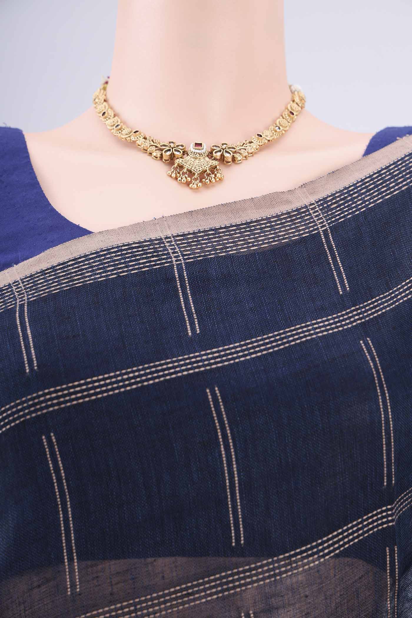 Border image of Navy Blue Linen Cotton Saree with Stripes on the body and Plain Border. 