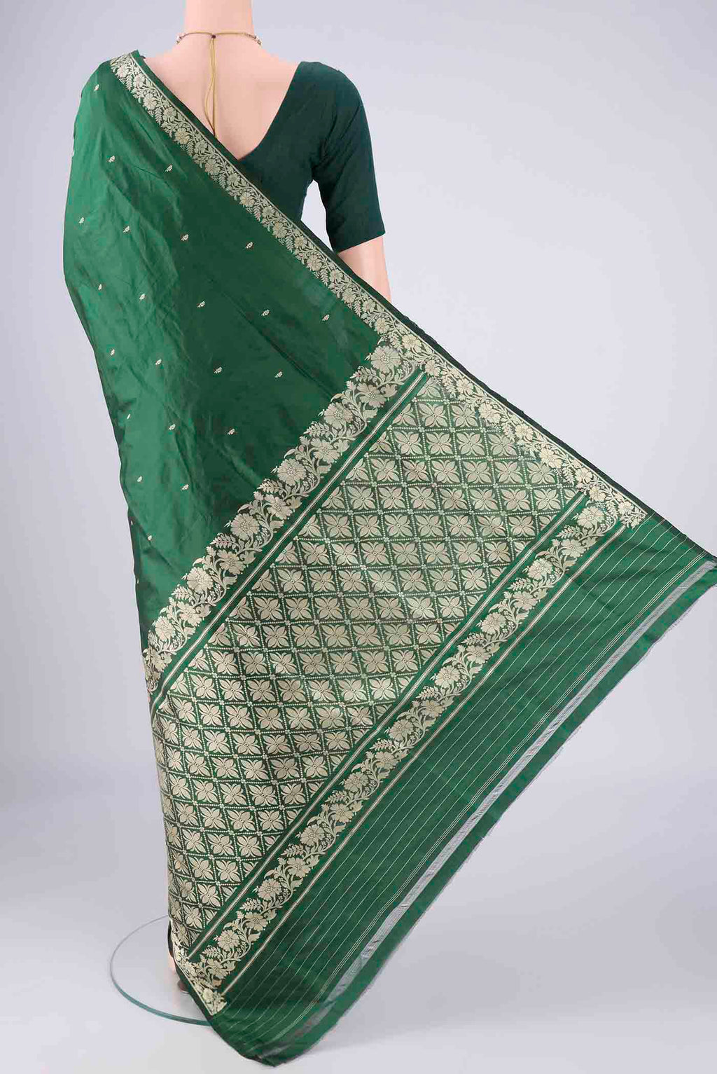 Flat view of Bottle Green Banarasi Silk Saree with Thread Butta on the body and Thread Border. 