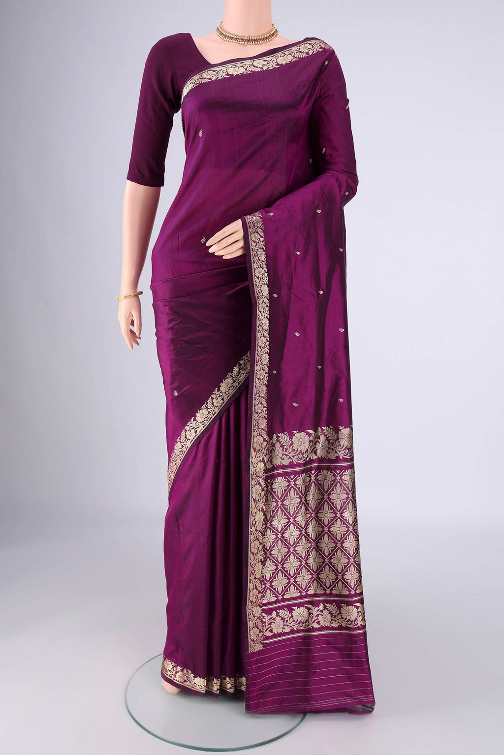 Purple Banarasi Silk Saree with Thread Butta on the body and Thread Border.  displayed on a mannequin