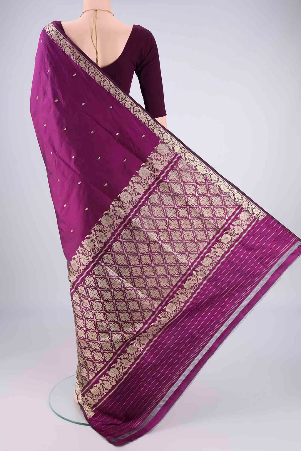 Flat view of Purple Banarasi Silk Saree with Thread Butta on the body and Thread Border. 