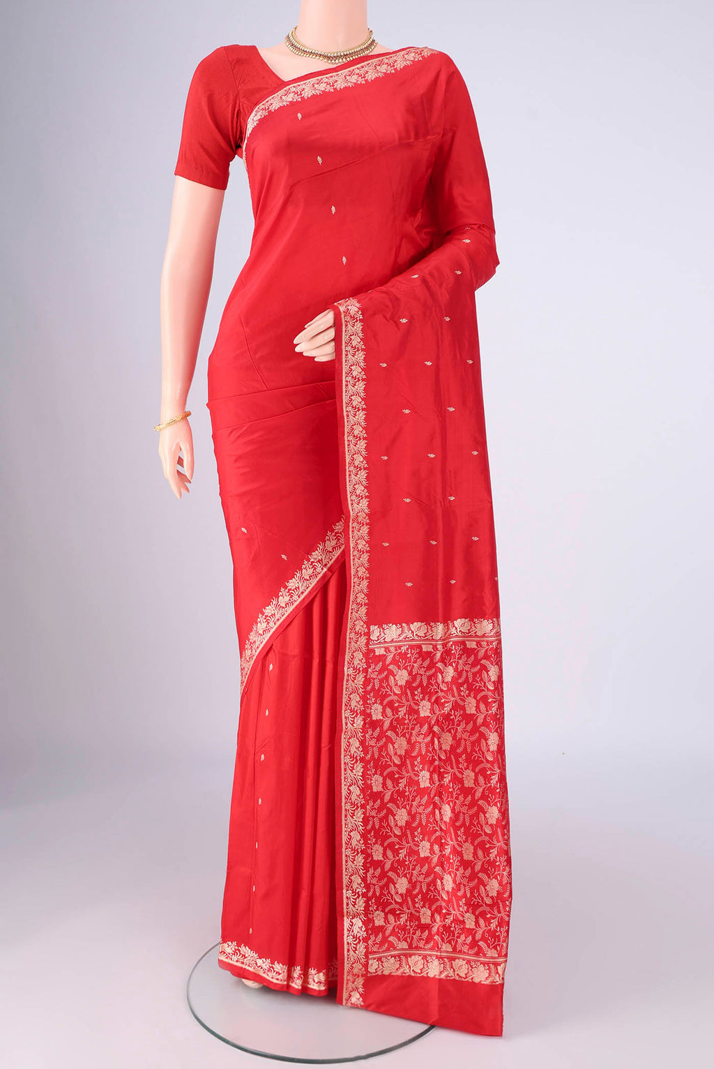Red Banarasi Silk Saree with Thread Butta on the body and Thread Border.  displayed on a mannequin