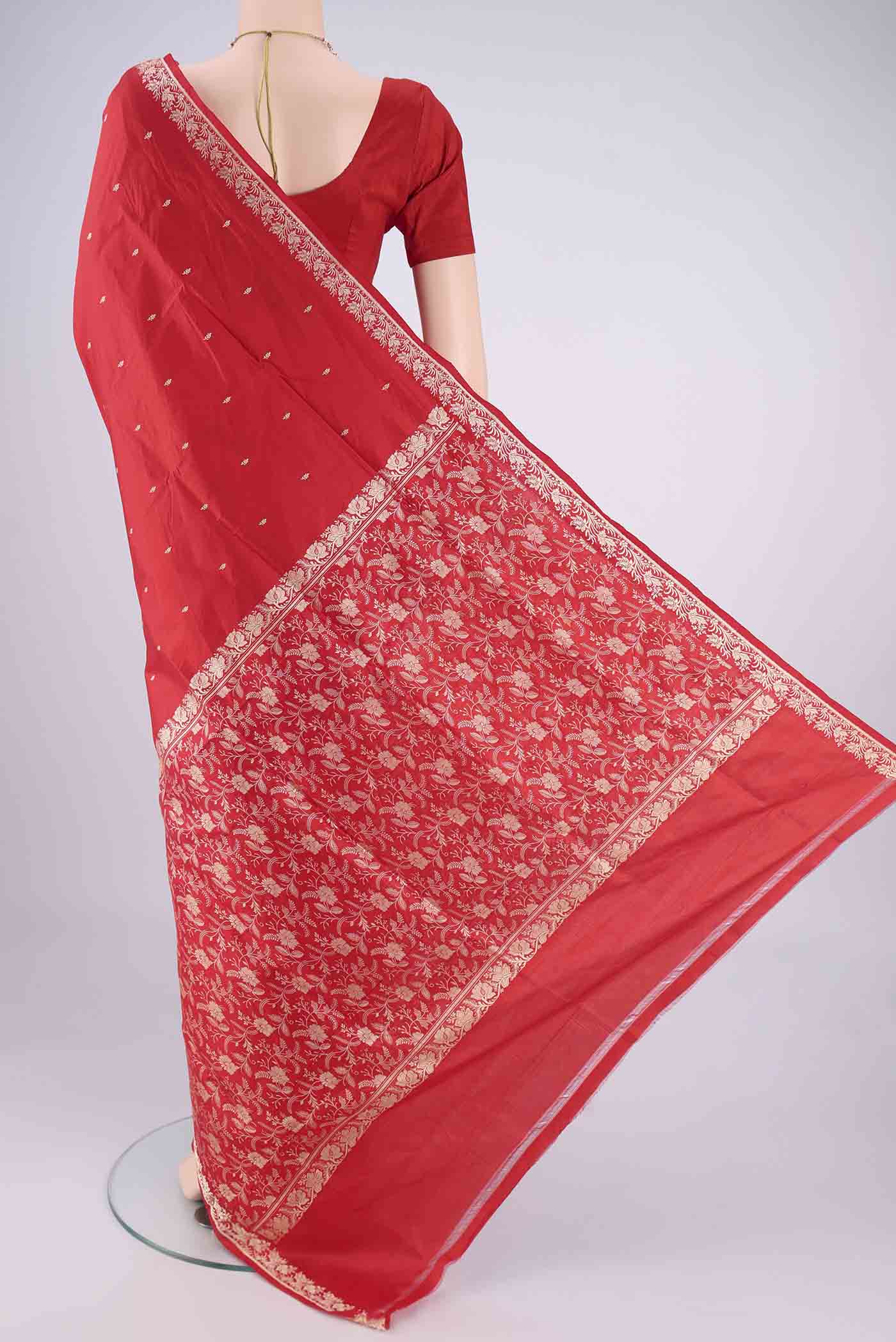 Flat view of Red Banarasi Silk Saree with Thread Butta on the body and Thread Border. 