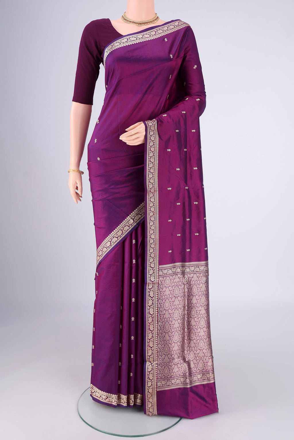Purple Banarasi Silk Saree with Thread Butta on the body and Thread Border.  displayed on a mannequin