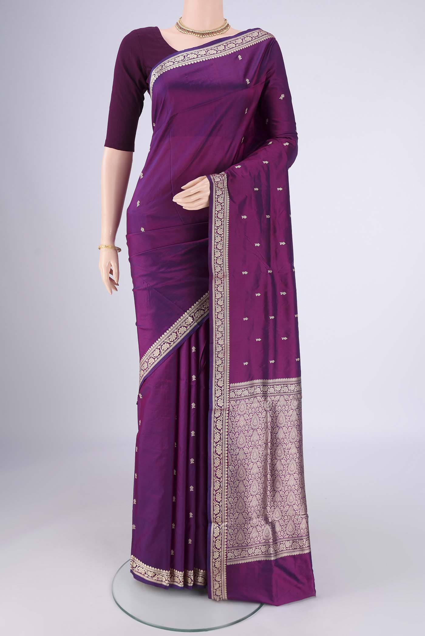 Purple Banarasi Silk Saree with Thread Butta on the body and Thread Border.  displayed on a mannequin