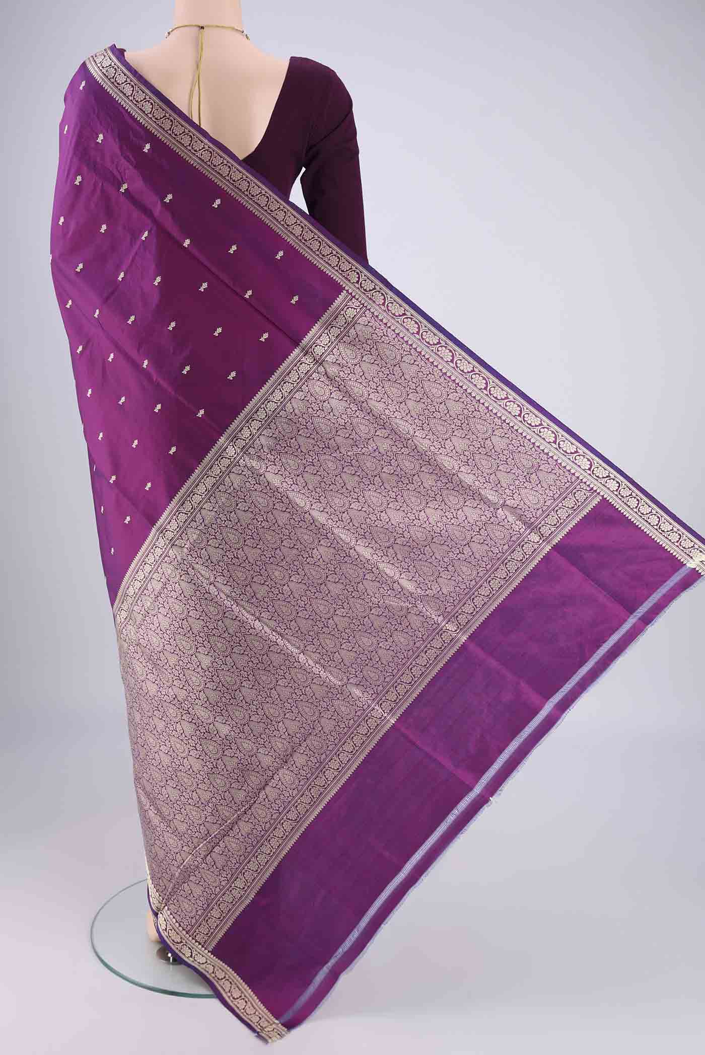 Flat view of Purple Banarasi Silk Saree with Thread Butta on the body and Thread Border. 