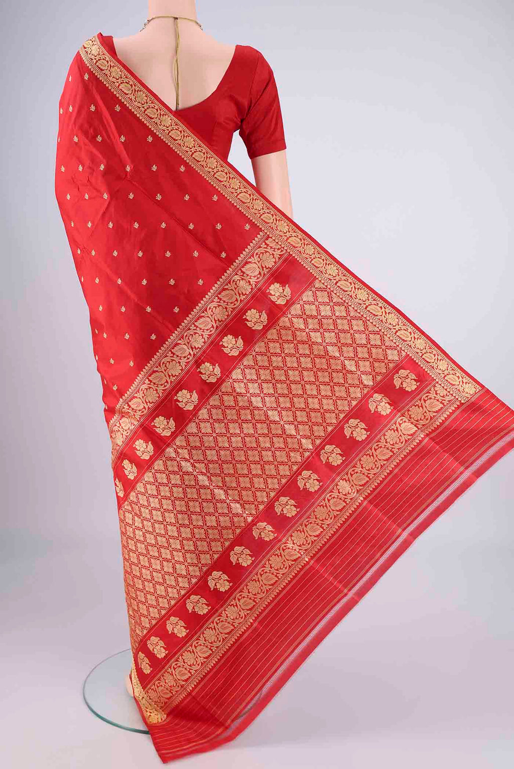 Flat view of Red Banarasi Silk Saree with Thread Butta on the body and Thread Border. 