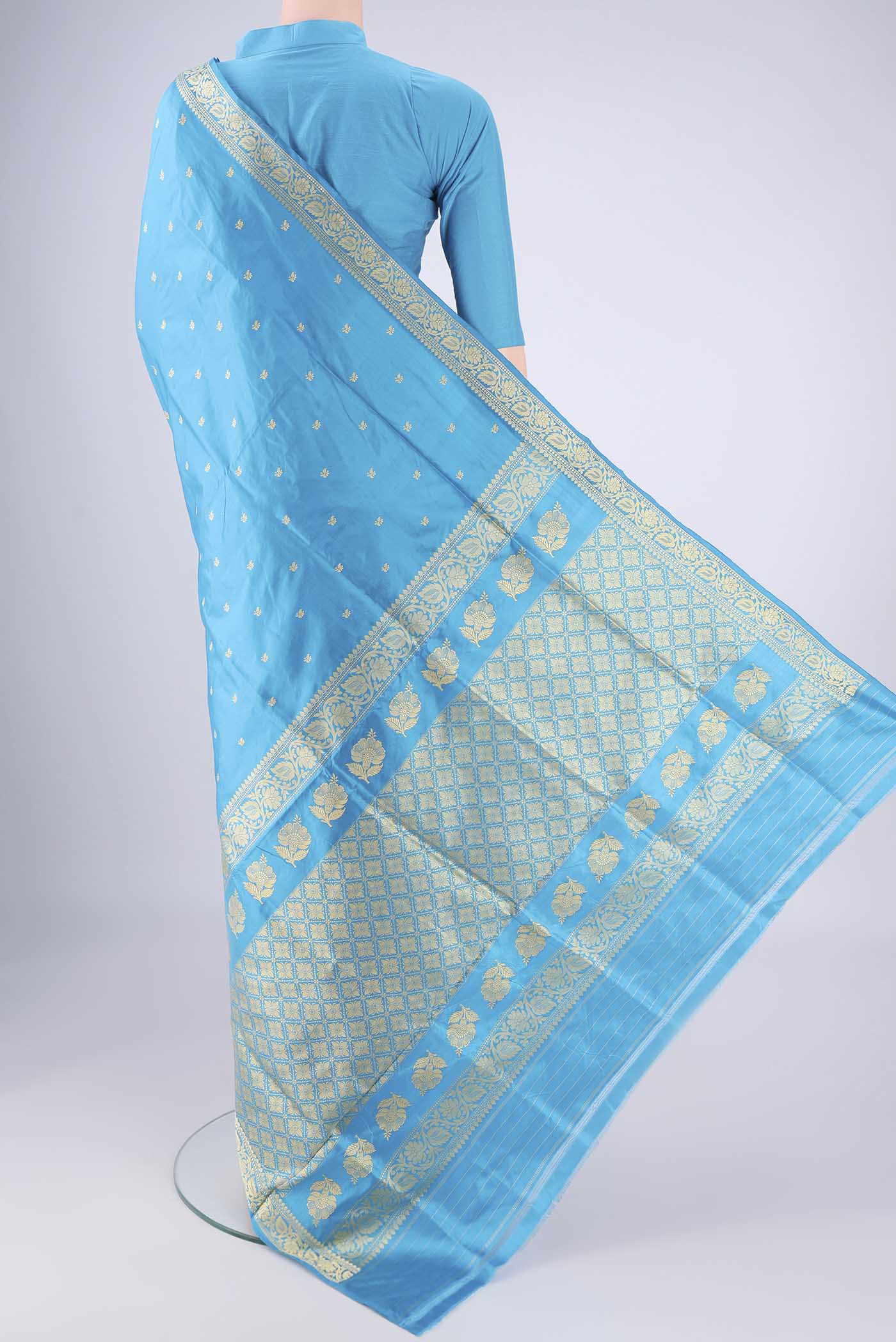 Flat view of Electric Blue Banarasi Silk Saree with Thread Butta on the body and Thread Border. 