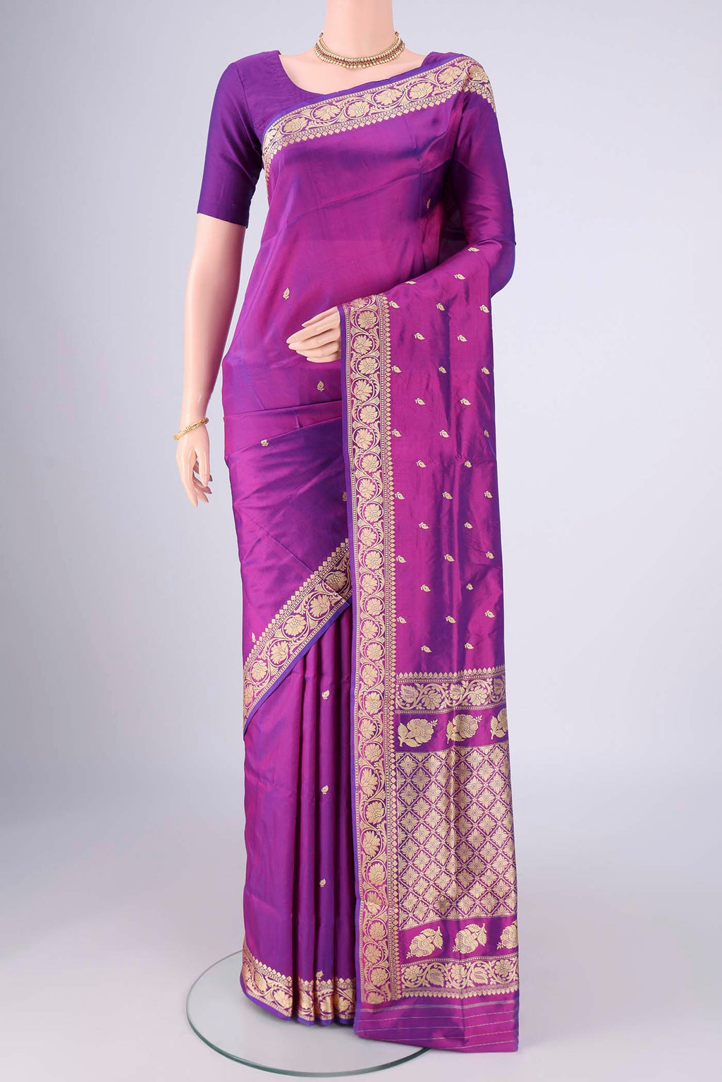 Purple Banarasi Katan Silk Saree with Thread Butta on the body and Thread Border.  displayed on a mannequin
