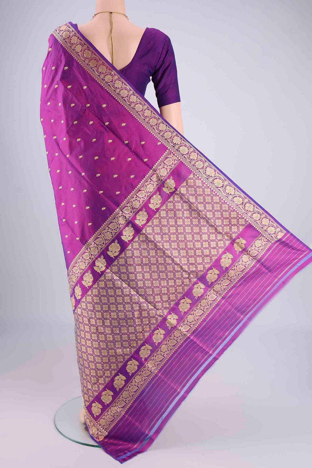 Flat view of Purple Banarasi Katan Silk Saree with Thread Butta on the body and Thread Border. 