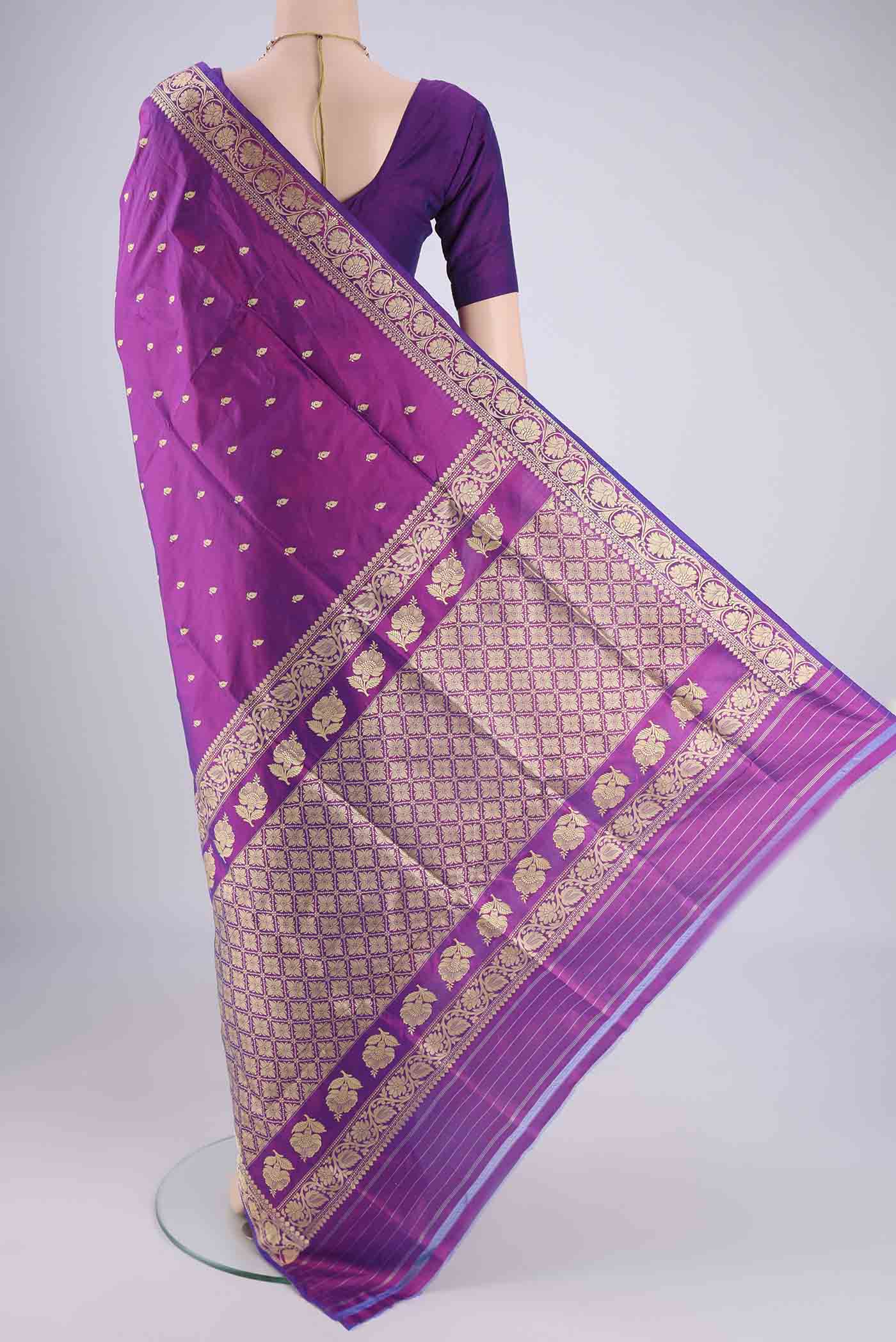 Flat view of Purple Banarasi Katan Silk Saree with Thread Butta on the body and Thread Border. 