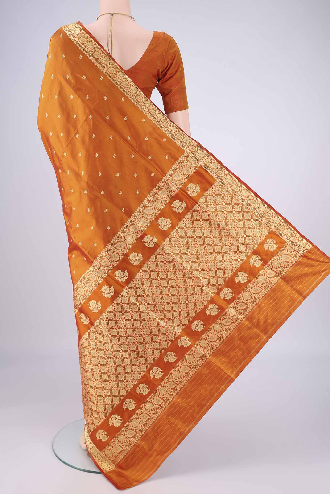 Flat view of Mustard Dual Tone Banarasi Silk Saree with Thread Butta on the body and Thread Border. 