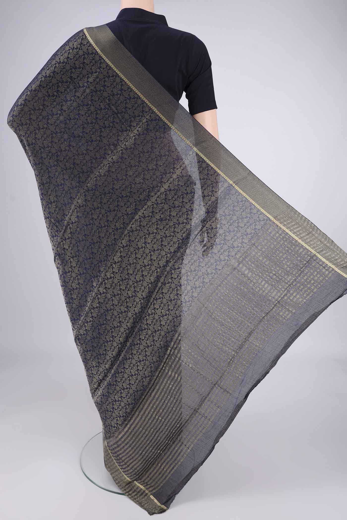 Flat view of Navy Blue Mysore Crepe Saree with Zari Brocade on the body and Zari Border. 